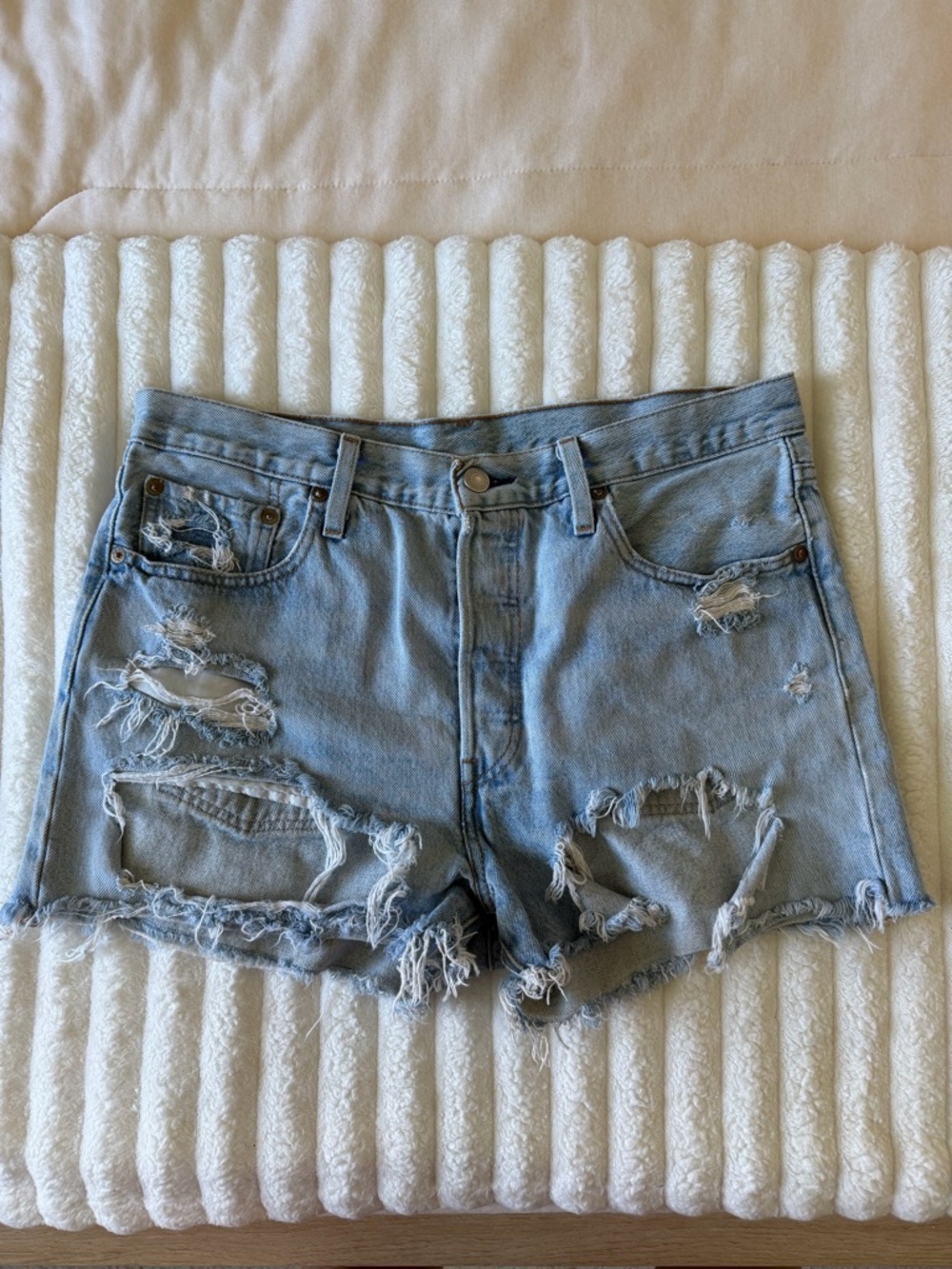 Levi’s Light Blue Distressed Jean Shorts